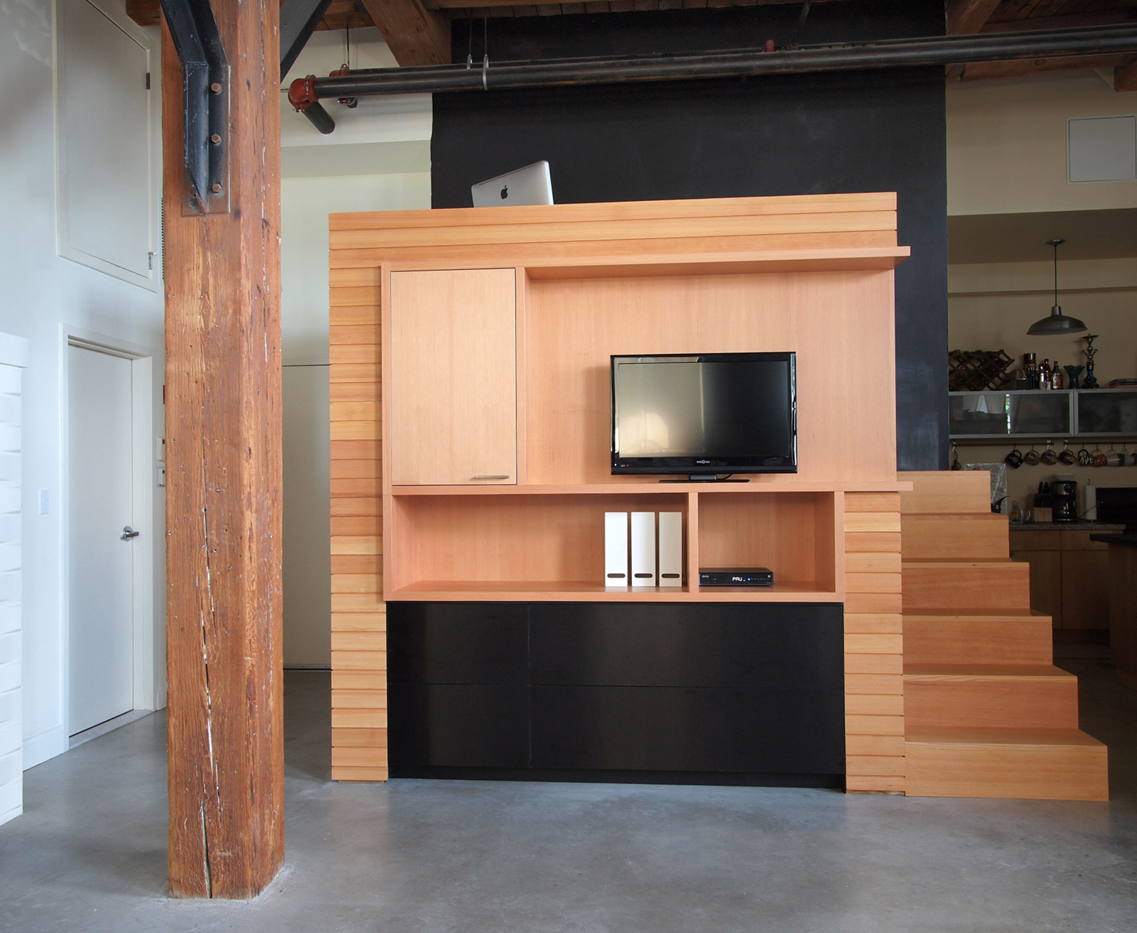 Loft renovation with custom media center, tv cabinet.